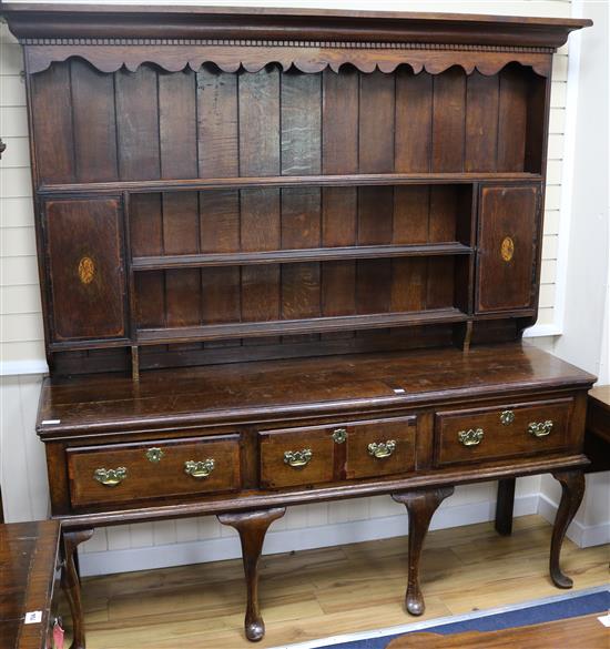 An early 17th century style oak dresser, W.203cm
